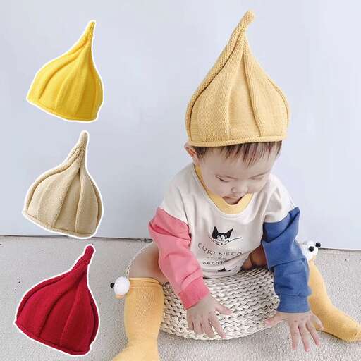 a small child wearing a hat