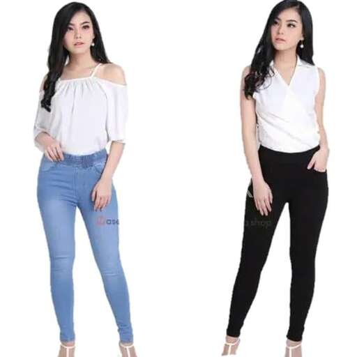 person in a white top and jeans