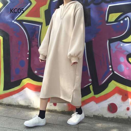 a long coat is worn by a man