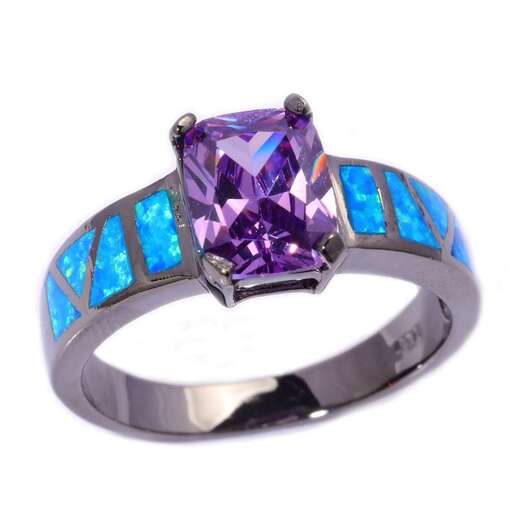 this ring is made with a sapphire and diamond.