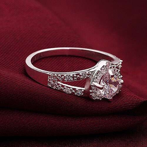 a diamond ring with a diamond and a diamond ring.