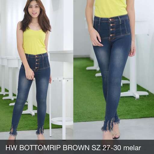 a model in a yellow top and blue jeans