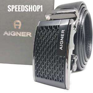 watch with a black leather strap