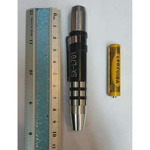 a pen with a ruler and ruler.
