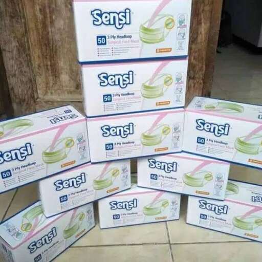 a stack of boxes of toilet paper