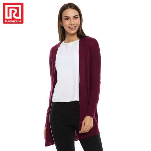 person in a classic cardigan