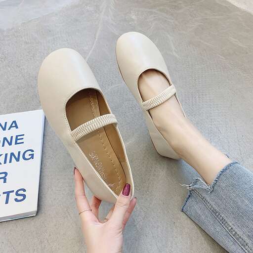 a pair of shoes with a touch of brown.