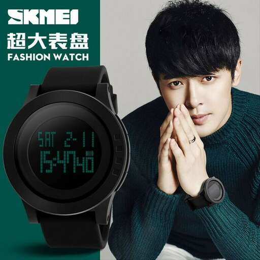 a man wearing a watch and watch