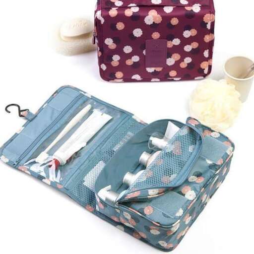 a bag with clothes and accessories on a white background.