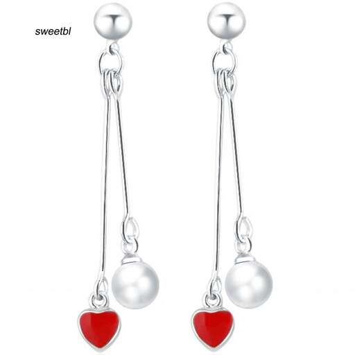 a pair of pearl and pearl earrings