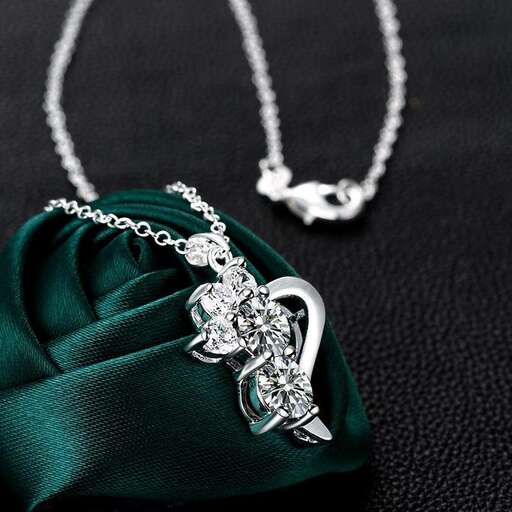 a pendant with a pendant on a chain.