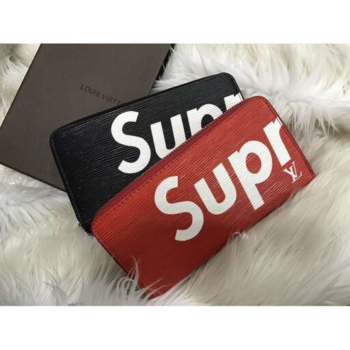 a black and red wallet with the word 