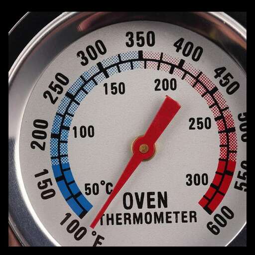 a clock with red and blue numbers and a red dial.