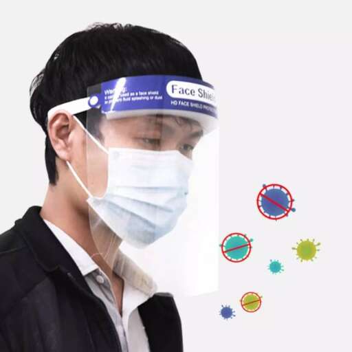 a man wearing a surgical mask with a medical symbol on his face.