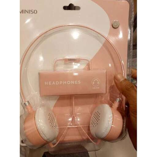 person in a pink box