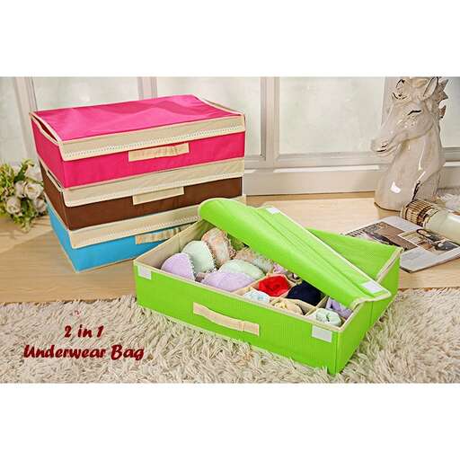 a green suitcase with a pink interior