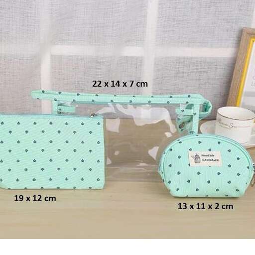 a small suitcase with a lid and a measuring cup.