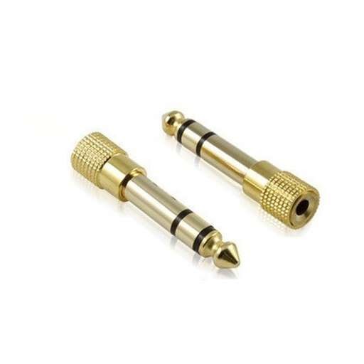 a pair of metal screws on a white background