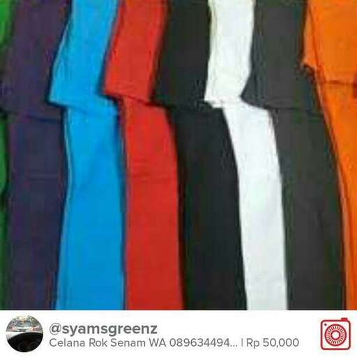 a variety of shirts in different colors.