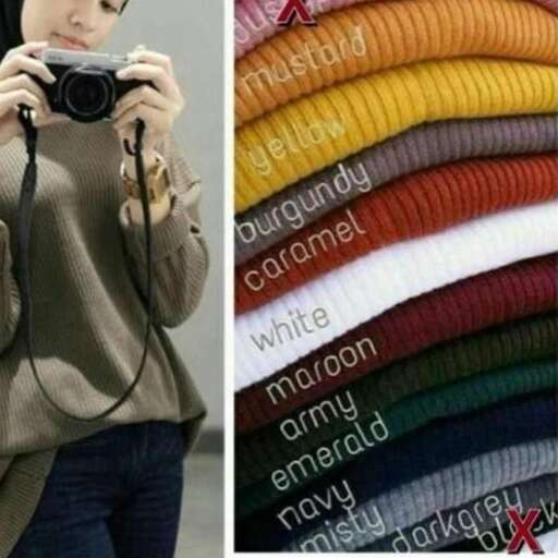 a woman with a bag of wool