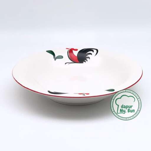 a bowl with a bird on it