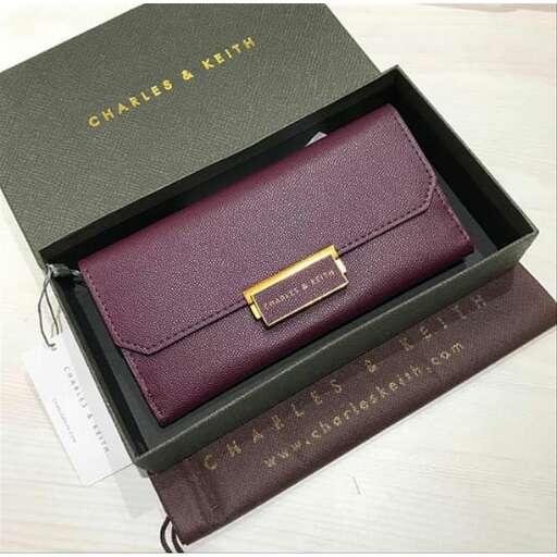 a small wallet in a small box