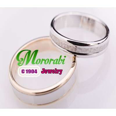 a wedding ring with a name
