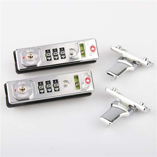 a pair of silver remote controls with buttons.