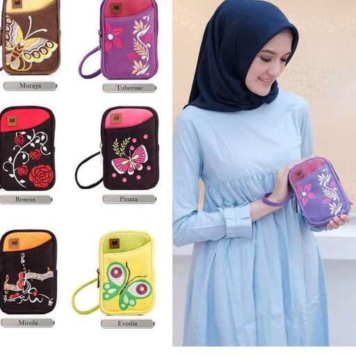 a girl in a blue dress holding a bag.