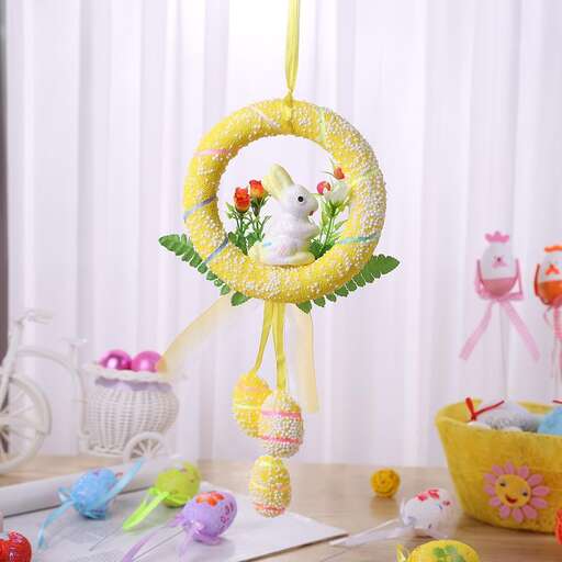 a wreath made of flowers and a bird.