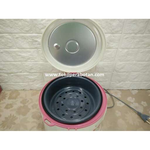 a round pink and black toilet with a pink lid.