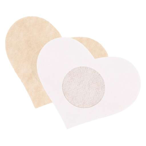 a white heart with a round circle in the middle