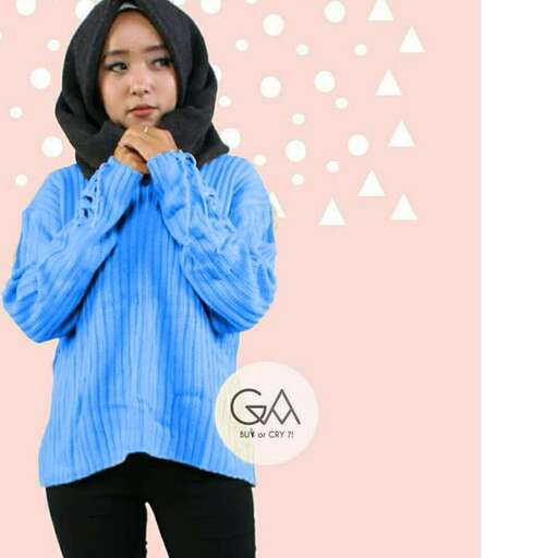 a girl in a blue sweater