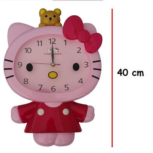 a pink clock with a heart on it