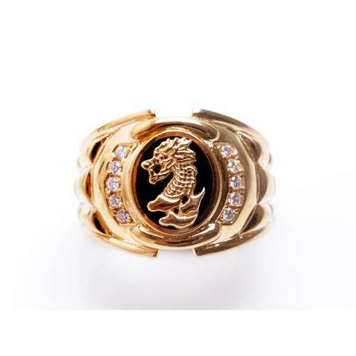 gold ring with a dragon on the top