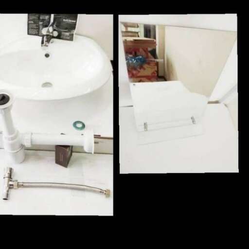 a bathroom with a sink and a toilet.