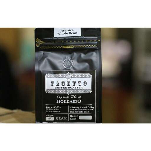 a black bag of coffee.