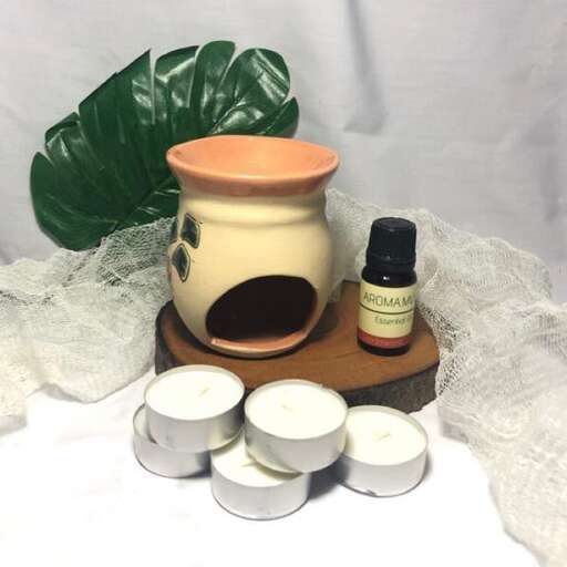 a small ceramic vase with a lid and a small jar.