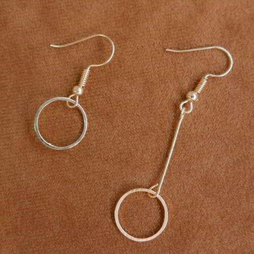 earrings in sterling silver with a pair of earrings