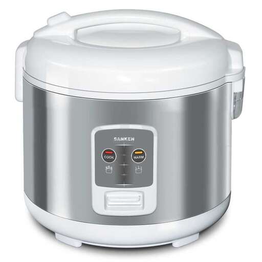 a white crock pot with a lid on top of it.