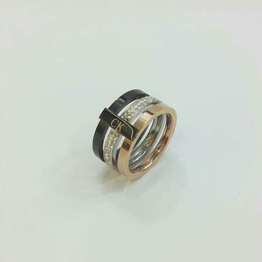 this ring is made of sterling silver and has a black band around the center.