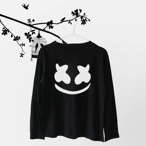 a cute shirt with a smiley face on it.