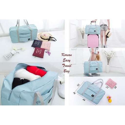 a picture of a bed with a bag and a purse.