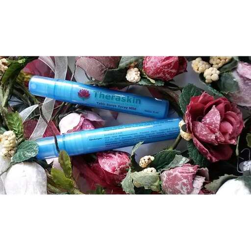 blue inks in a bouquet of roses