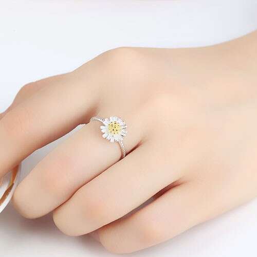 a ring with a flower on it.