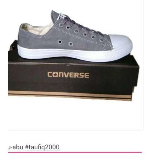 a pair of grey sneakers