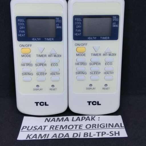 two white cell phones with a digital display