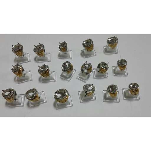 a set of mini silver and gold buttons