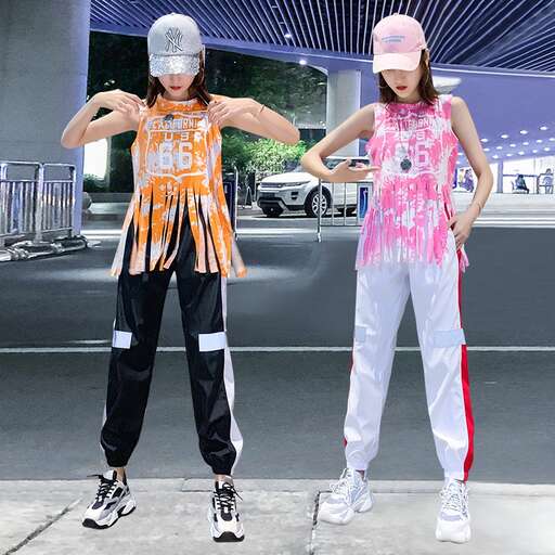 a couple of girls standing next to each other.