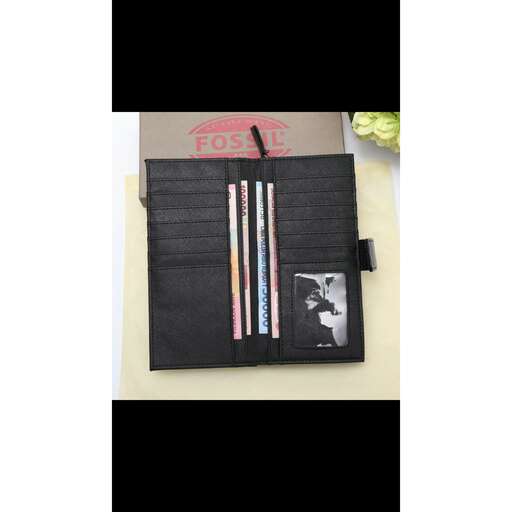 a pencil case with a pencil in it.